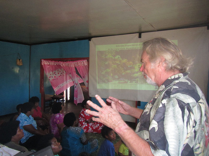 Walt Smith of ADE Fiji teaching the villagers about the corals and how the process works